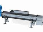 The Duperon Shaftless Screw Conveyor in action, automatically transferring debris from a wastewater treatment facility to a remote discharge point.